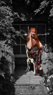 Eileen Daly in the garden between setups