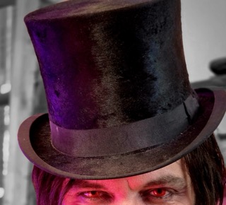 Close on the Ripper's red eyes beneath the top hat